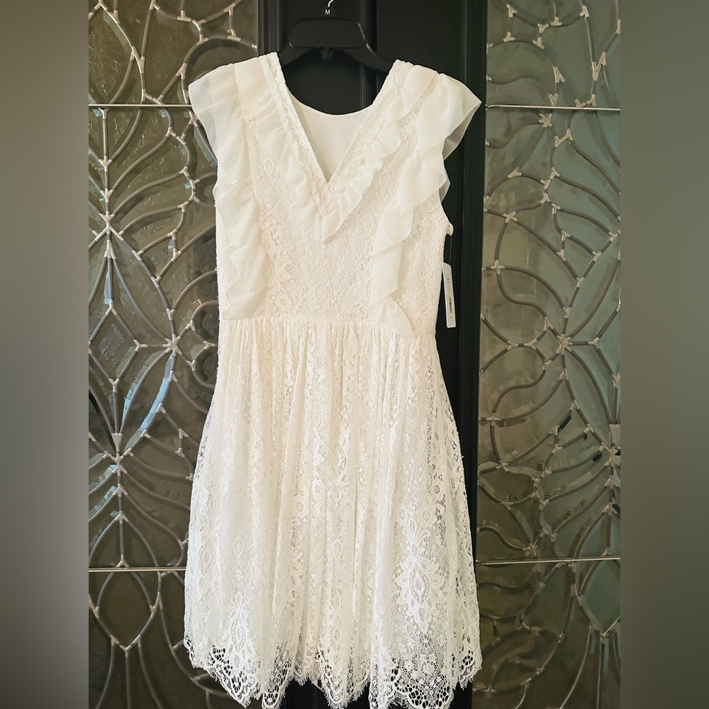 Mikael Aghal white lace dress.